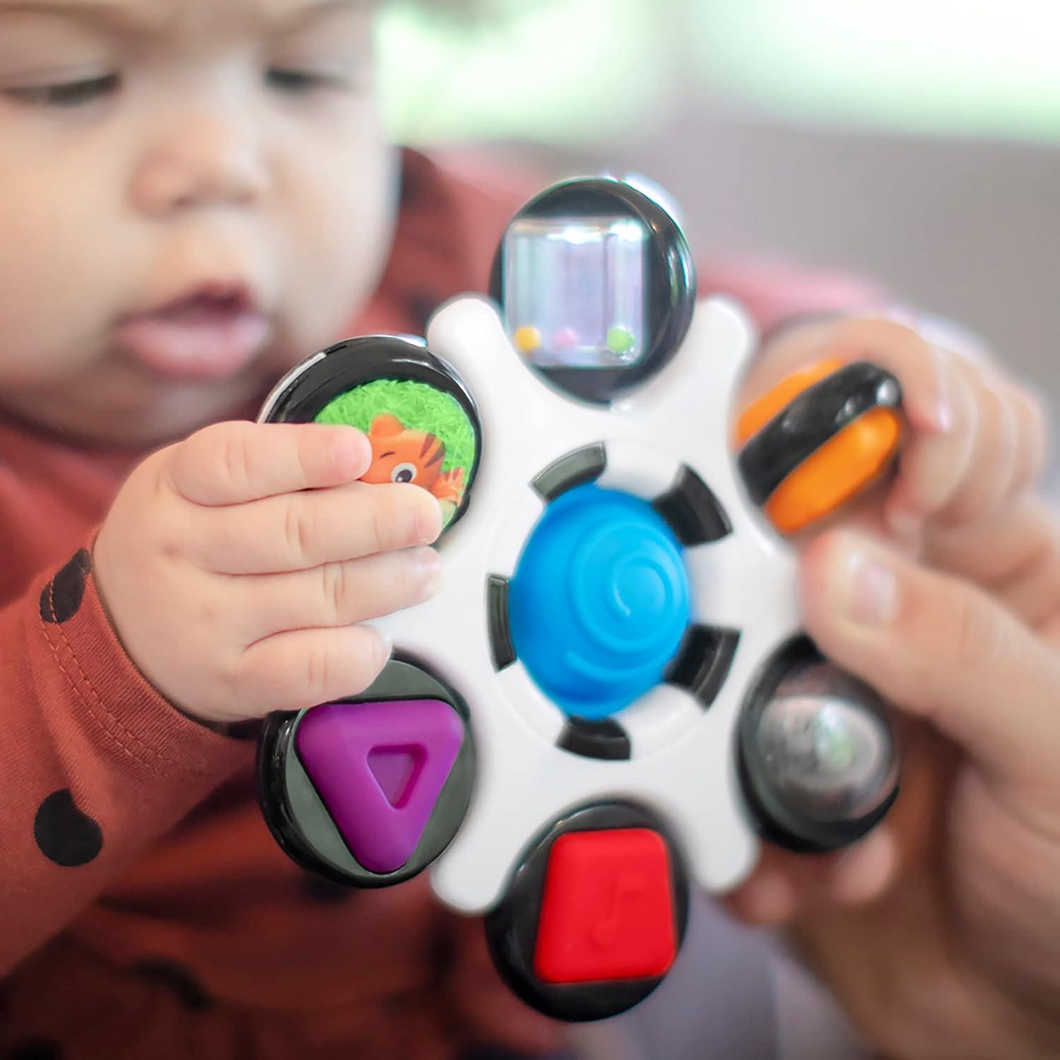 imageBaby Einstein Curiosity Clutch Fidget Sensory Toy and Pop It Rattle BPA Free Infant Teether Age 3 Months Multicolored