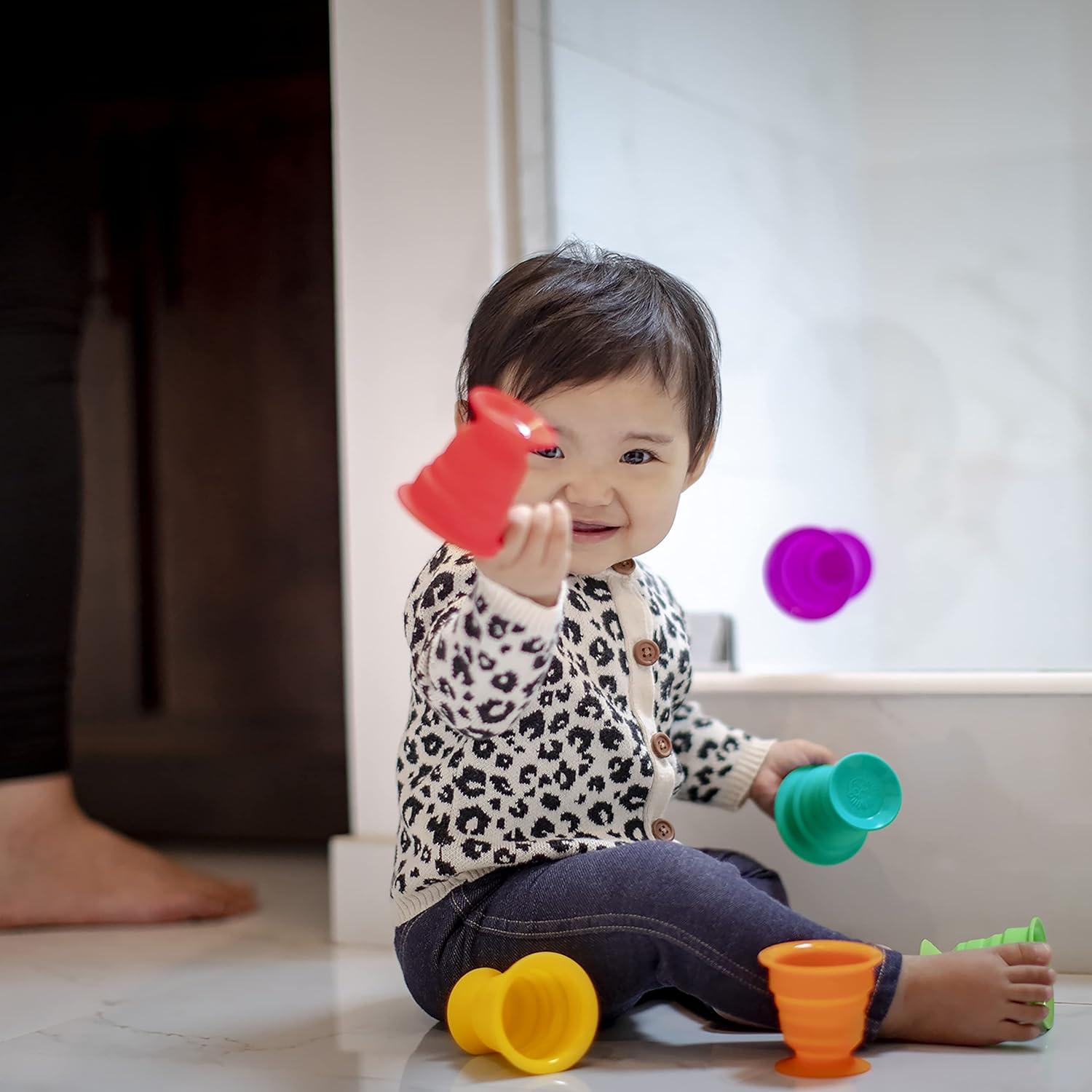 imageBaby Einstein Stack ampamp Squish Cups Infant to Toddler Collapsible Sensory Toys for Beach Bath Floor ampamp More 6pcs 3 Months