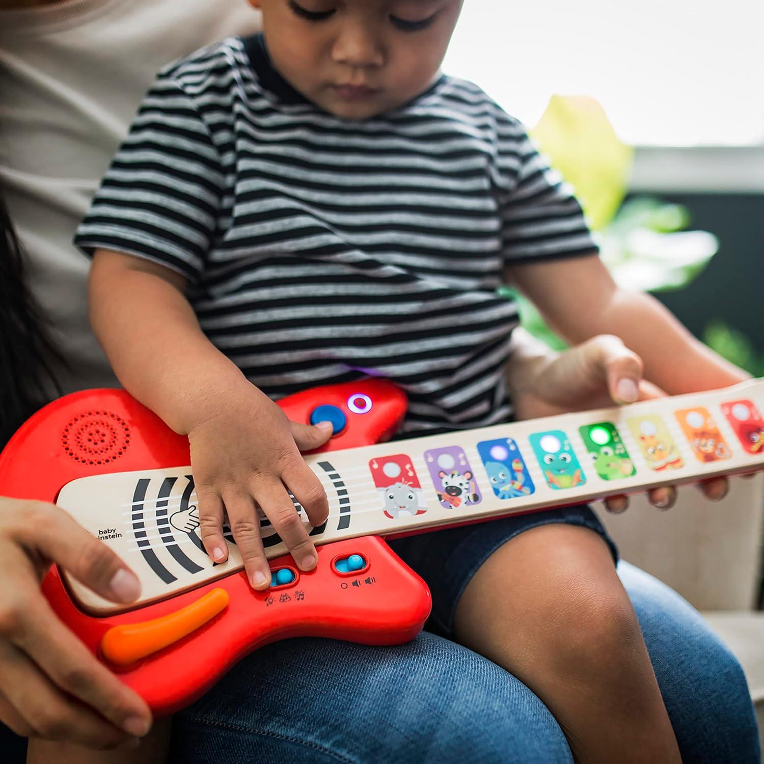 imageBaby Einstein Together in Tune Piano ampamp Guitar Bundle Safe Wireless Wooden Musical Toddler Toys Magic Touch 6 MonthsConnected Guitar