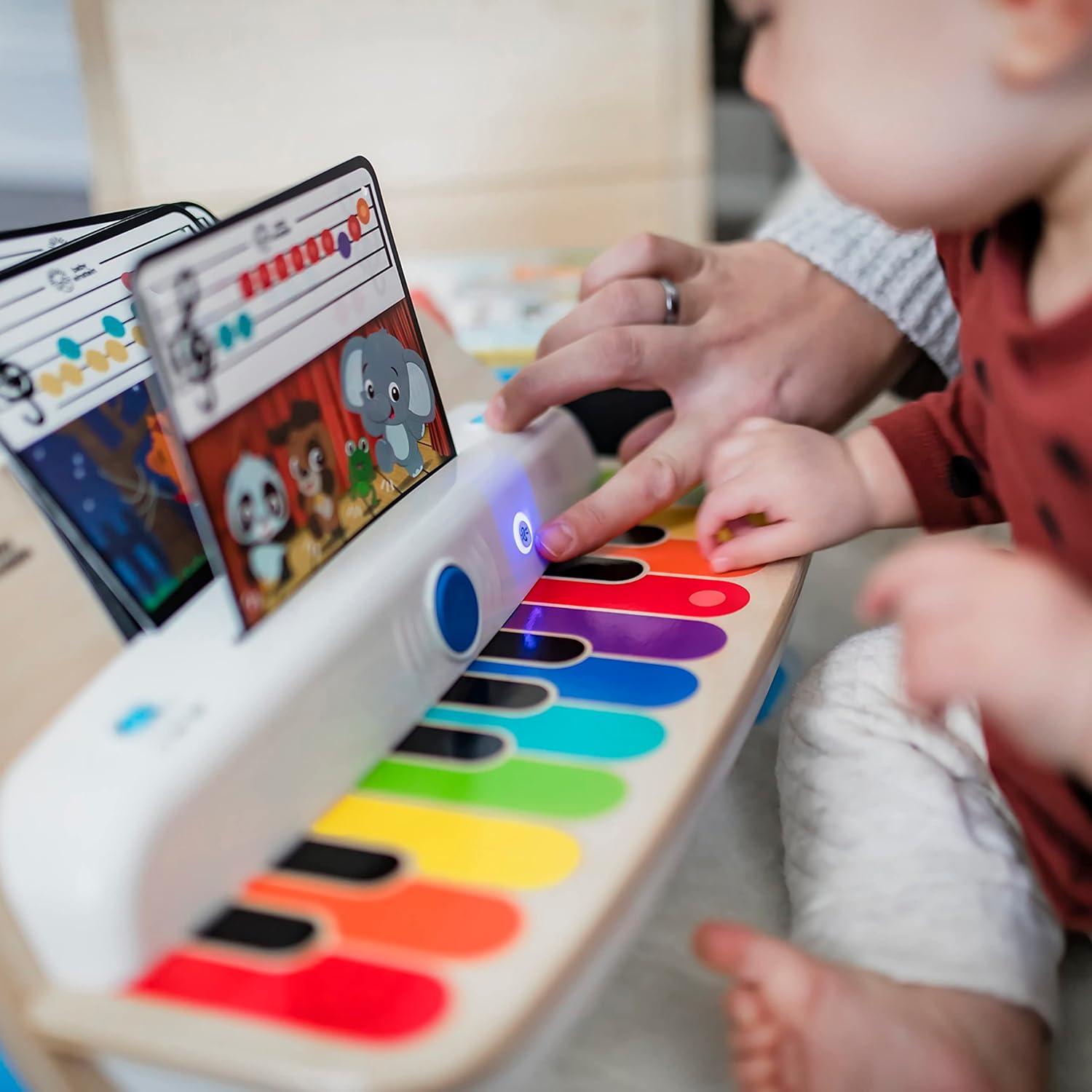 imageBaby Einstein Together in Tune Piano ampamp Guitar Bundle Safe Wireless Wooden Musical Toddler Toys Magic Touch 6 MonthsConnected Piano