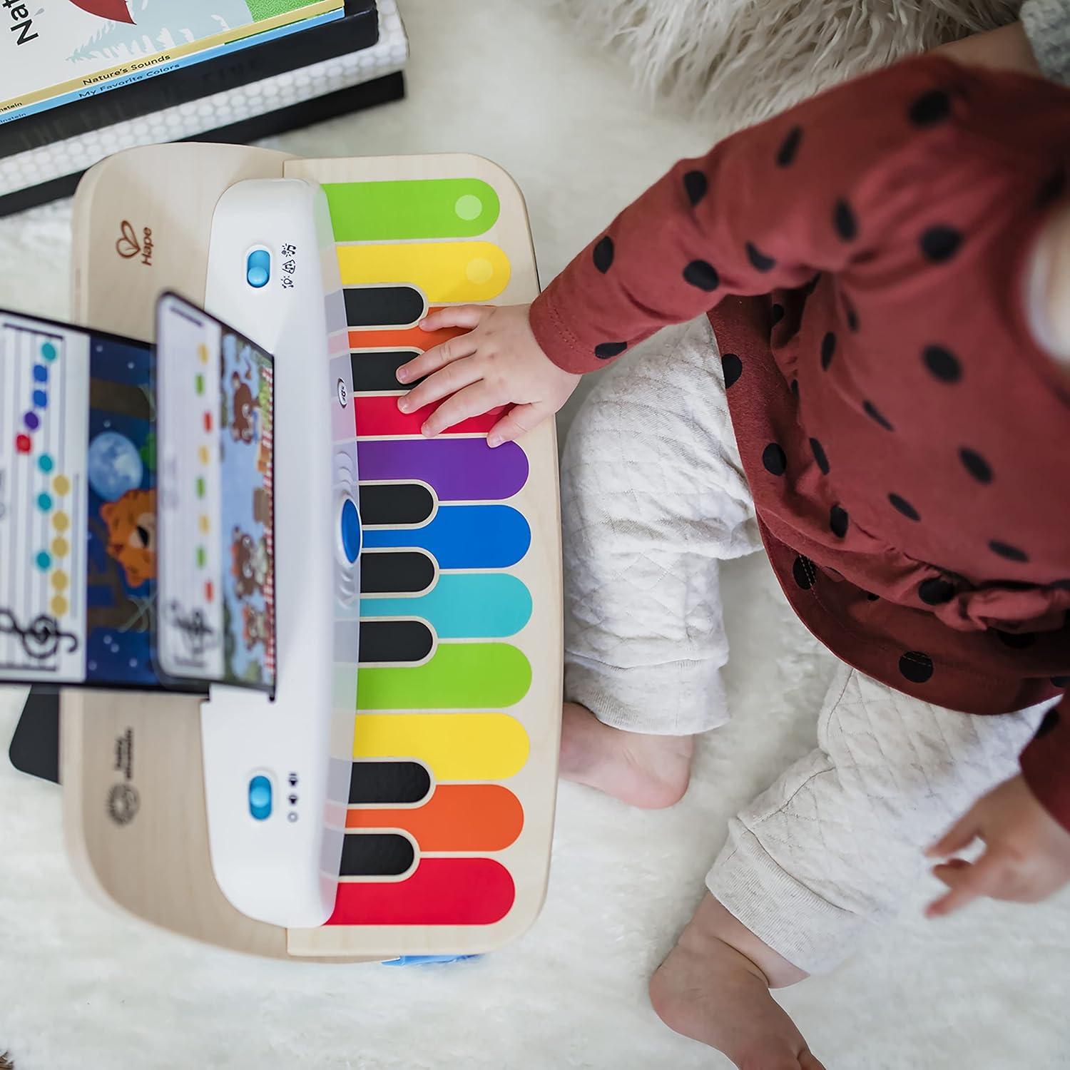 imageBaby Einstein Together in Tune Piano ampamp Guitar Bundle Safe Wireless Wooden Musical Toddler Toys Magic Touch 6 MonthsConnected Piano