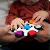 imageBaby Einstein Curiosity Clutch Fidget Sensory Toy and Pop It Rattle BPA Free Infant Teether Age 3 Months Multicolored