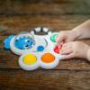 imageBaby Einstein Octopus 3in1 Bubble Pop Dimple Fidget Toy and BPA Free Teether Age 6 Months