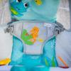 imageBaby Einstein Ocean Explorers Kick to It Opus Musical Infant to Toddler Rocker Baby Chair BabyActivated Music and Lights Ages 030 MonthsNeptune Bouncer