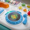 imageBaby Einstein Musical Mix N Roll 4in1 Push Walker Activity Center Toddler Table ampamp Floor Toy 100 Songs ampamp Phrases DJ Station with Piano