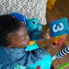 imageBaby Einstein Ocean Explorers Airplane Adventure 2in1 Interactive Activity Jumper with Lights Ages 6 months  Max weight 25 lbs UnisexCuriosity Cove