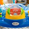 imageBaby Einstein Ocean Explorers Airplane Adventure 2in1 Interactive Activity Jumper with Lights Ages 6 months  Max weight 25 lbs UnisexNeptunes Ocean